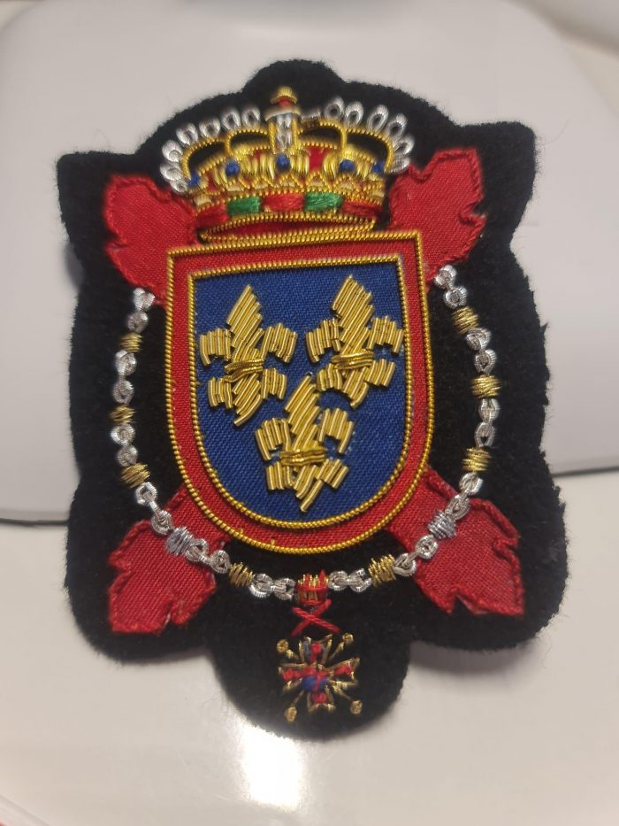 Escudo para chaqueta con sujeción doble PIN
